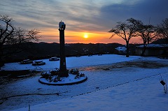 雪の日の夕日